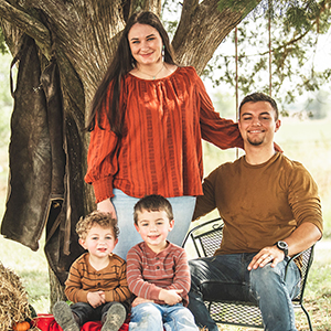 Alyssa Black, her husband and two sons.