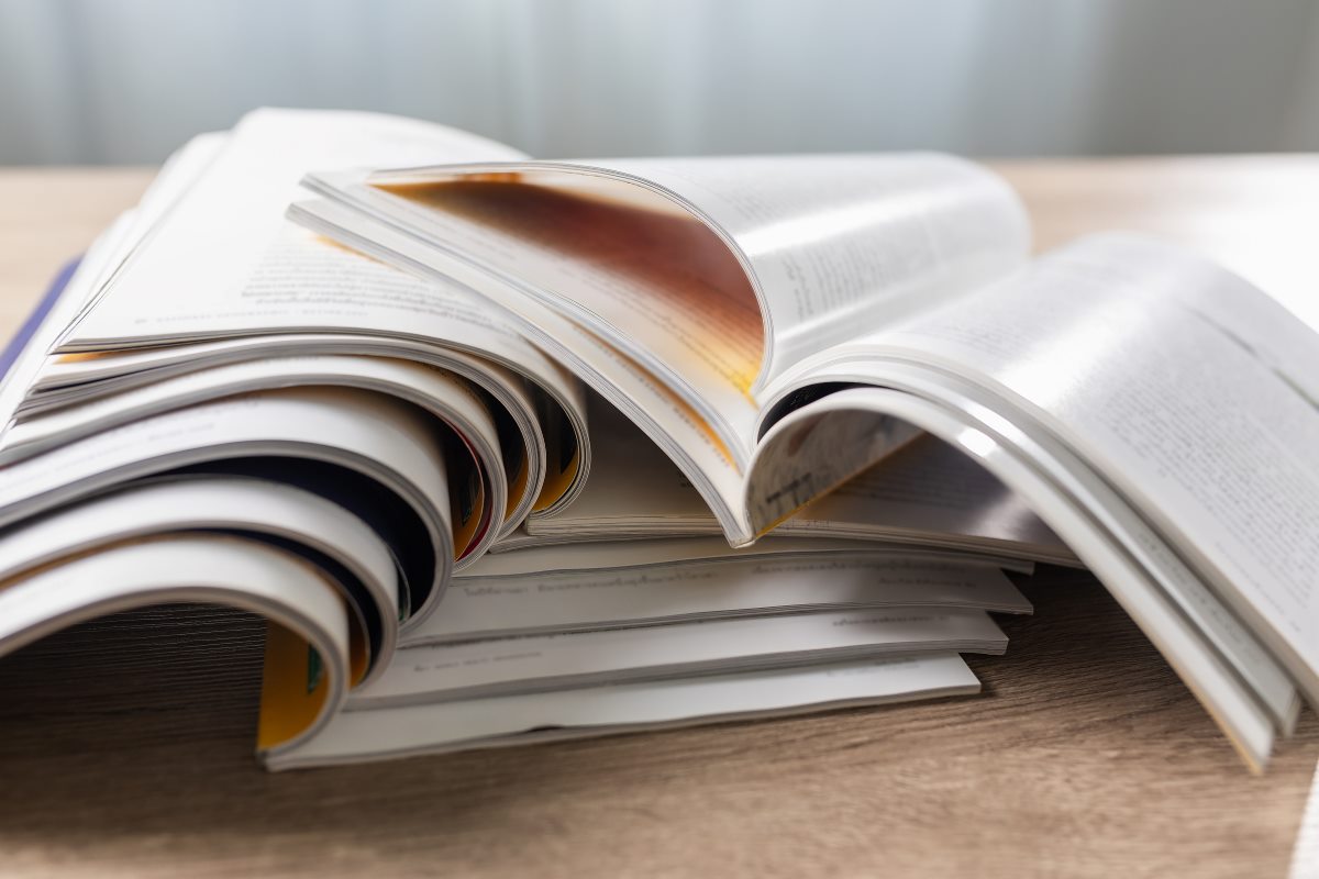 A stack of open magazines