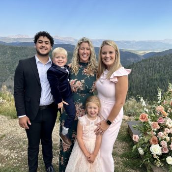 Lauren Wilhelm standing outside with her family