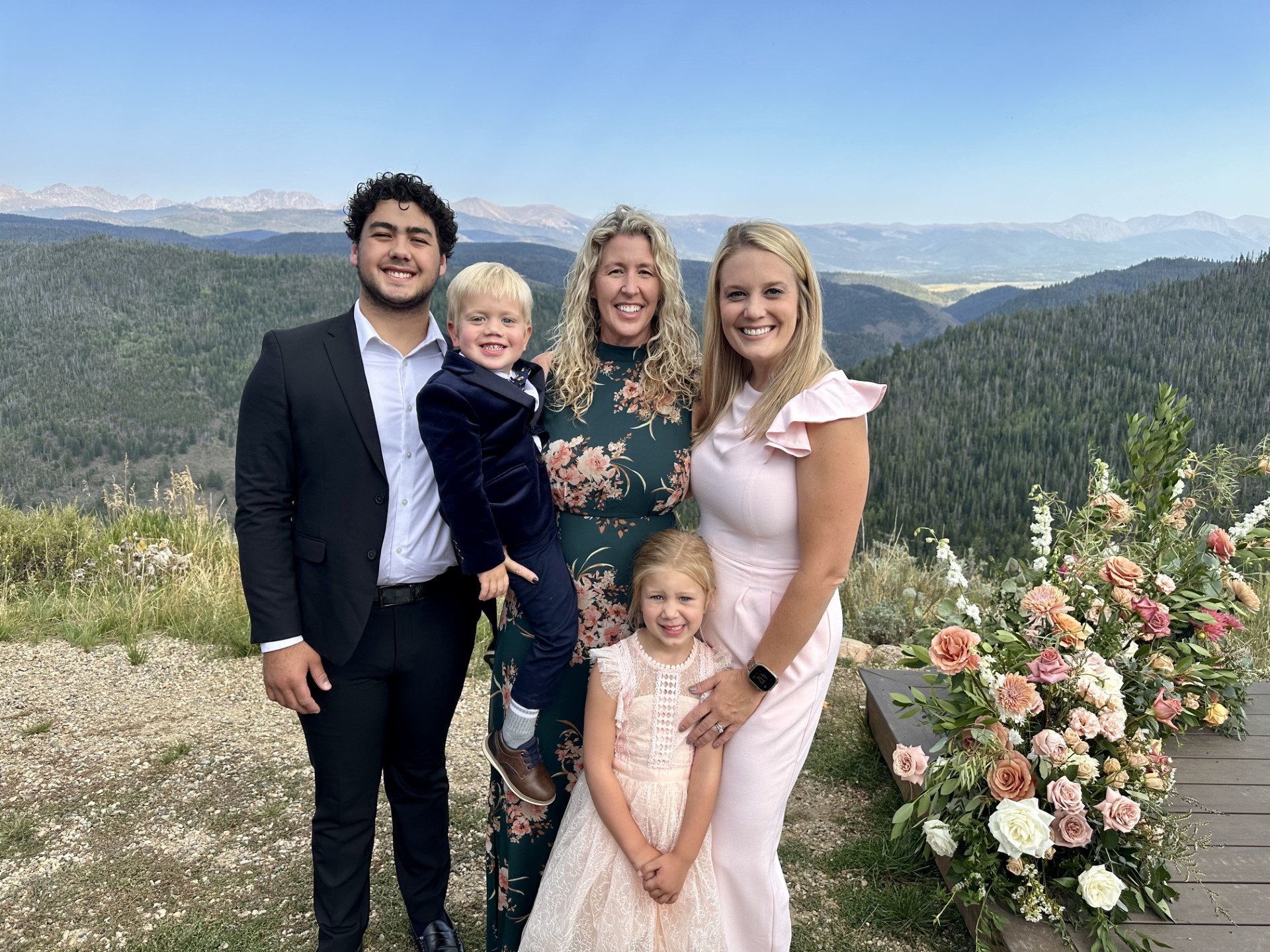 Lauren Wilhelm standing outside with her family