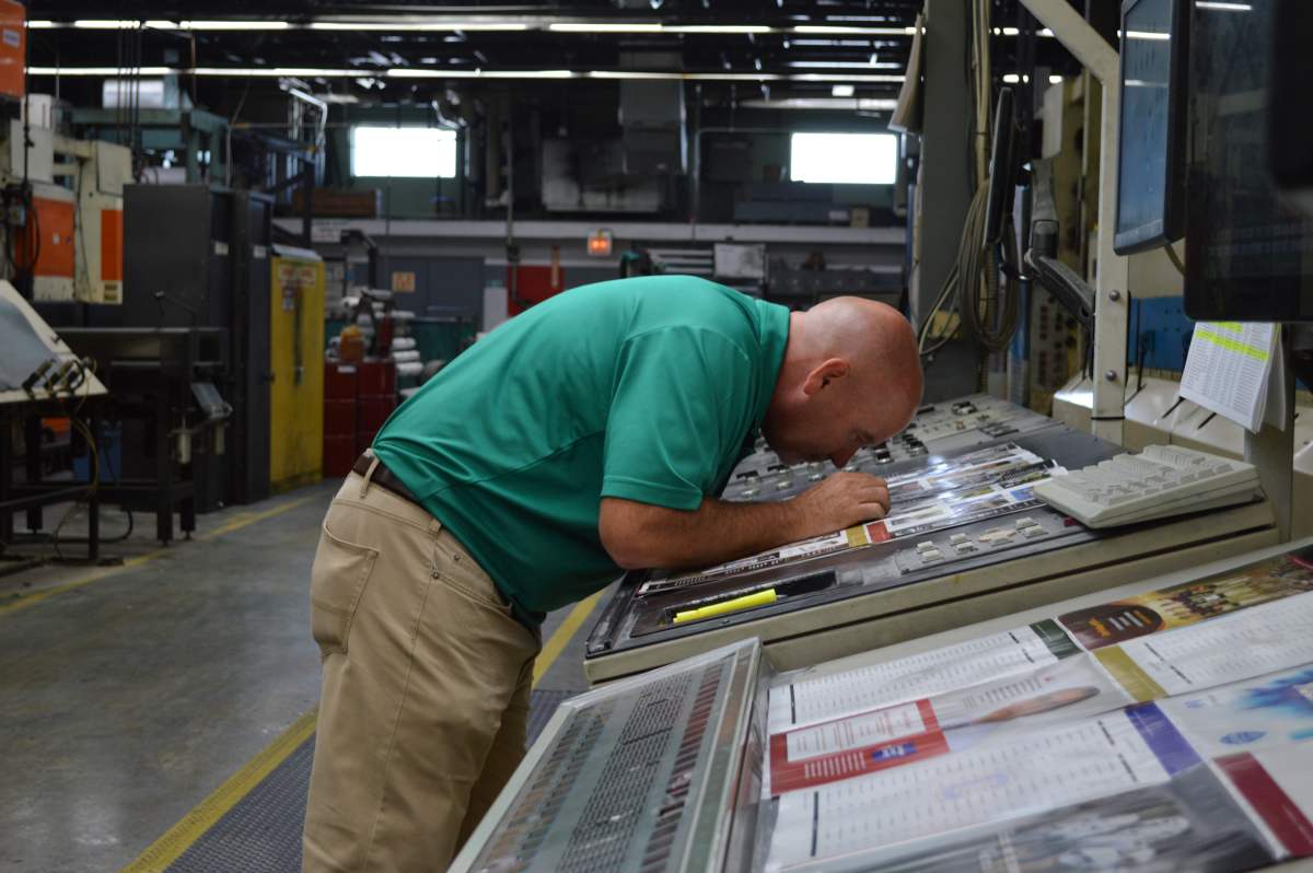 Kevin W. Looking at a print proof