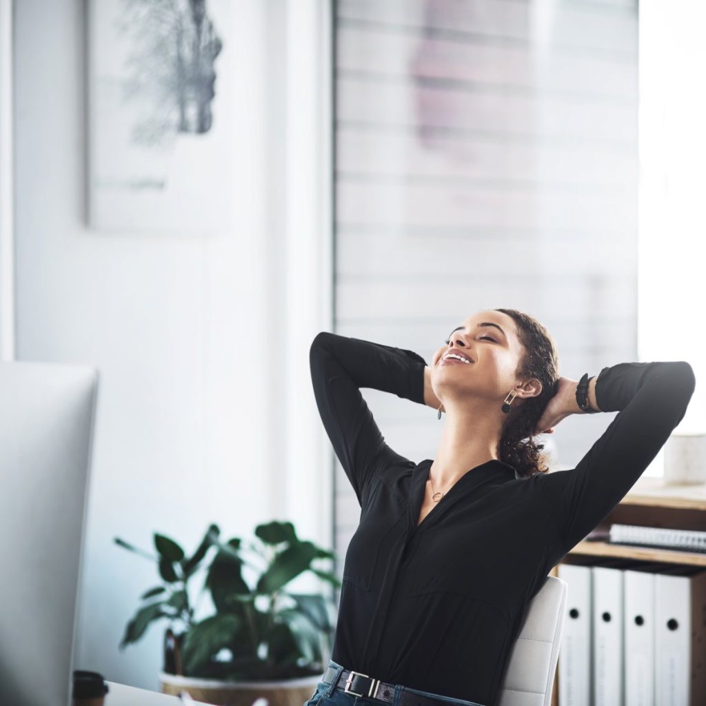 A businesswoman looking relaxed and happy